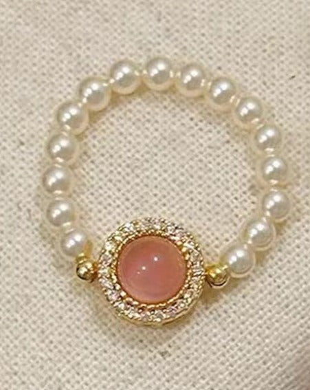 Pink Chalcedony and Pearl Ring: Light-Responsive Stone